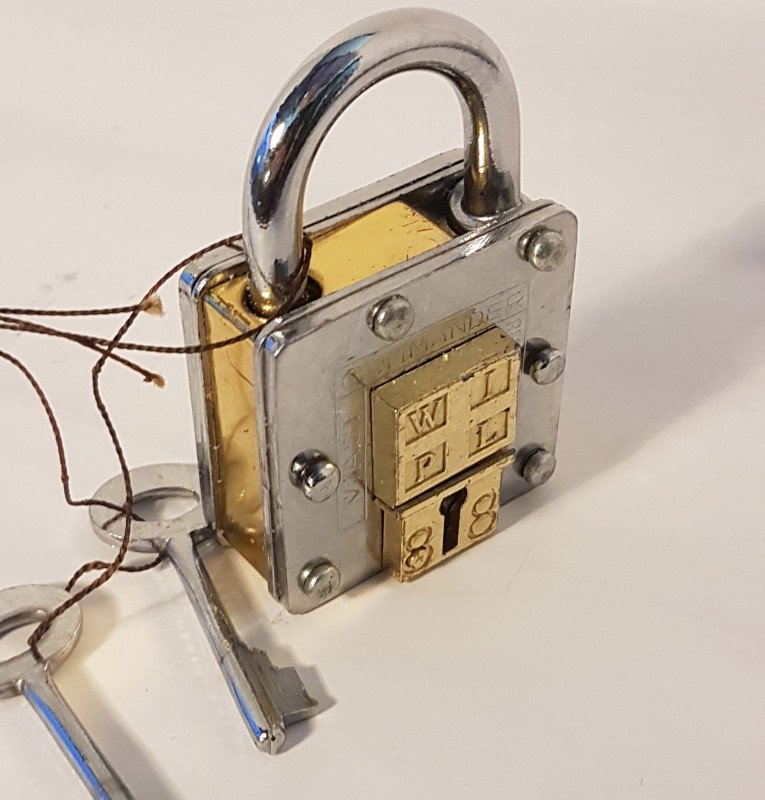 Pad lock, antique 2 key puzzle lock. Functional padlock with tricky hidden keyhole. Collectible vintage design chrome & brass details.