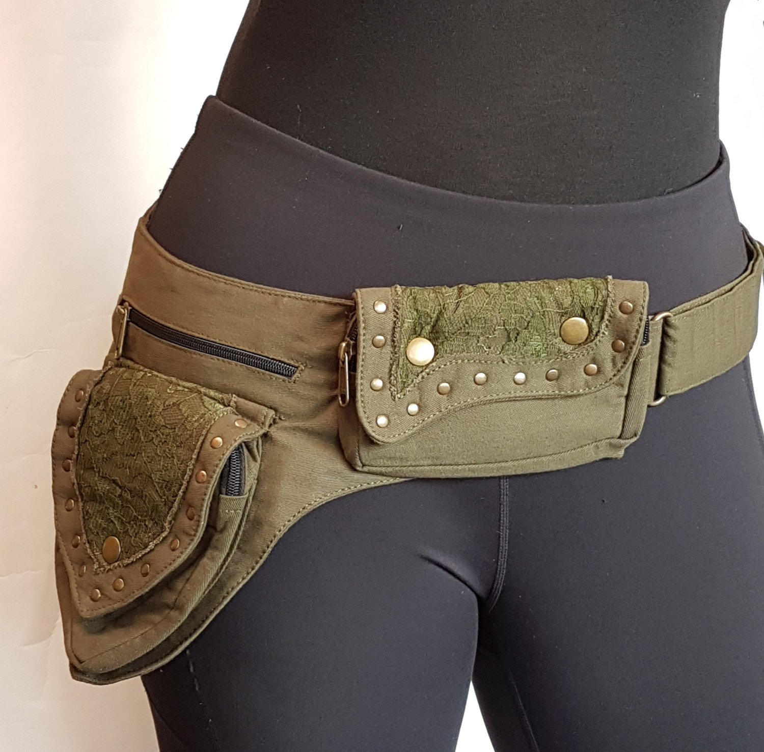 Utility belt 5 pocket design in army green. Adjusts to 48 inch hip/waist. Lace detail.  Great for shopping, traveling, partying. Fab gift!