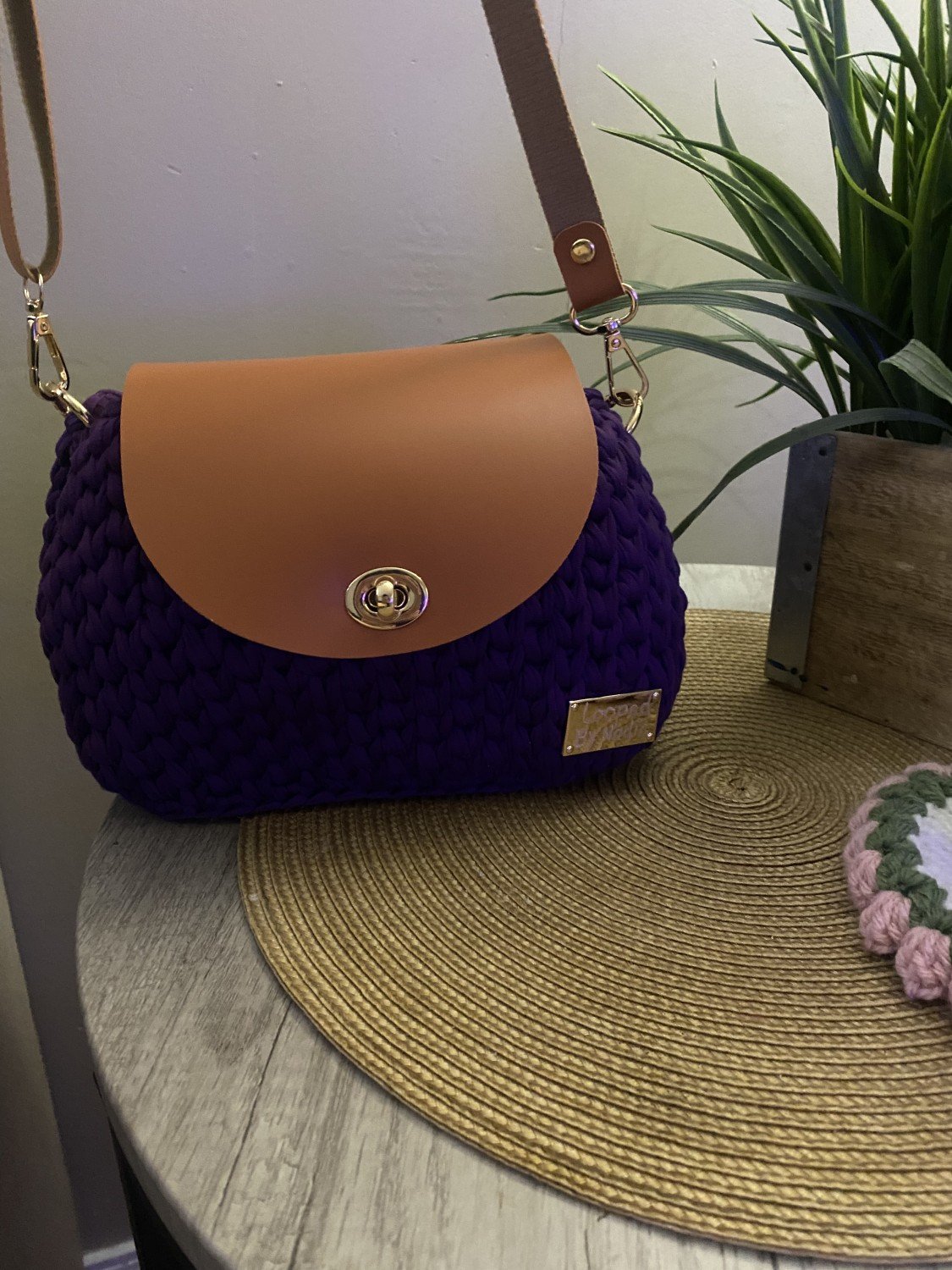 Looped,"Handcrafted Crochet Bag with Leather Strap, Bottom, and Elegant Accessories!